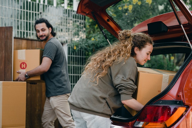 A couple of tenants moving into a rental property